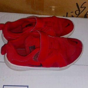 Baby boy size 1y Nike shoes Red skeankers